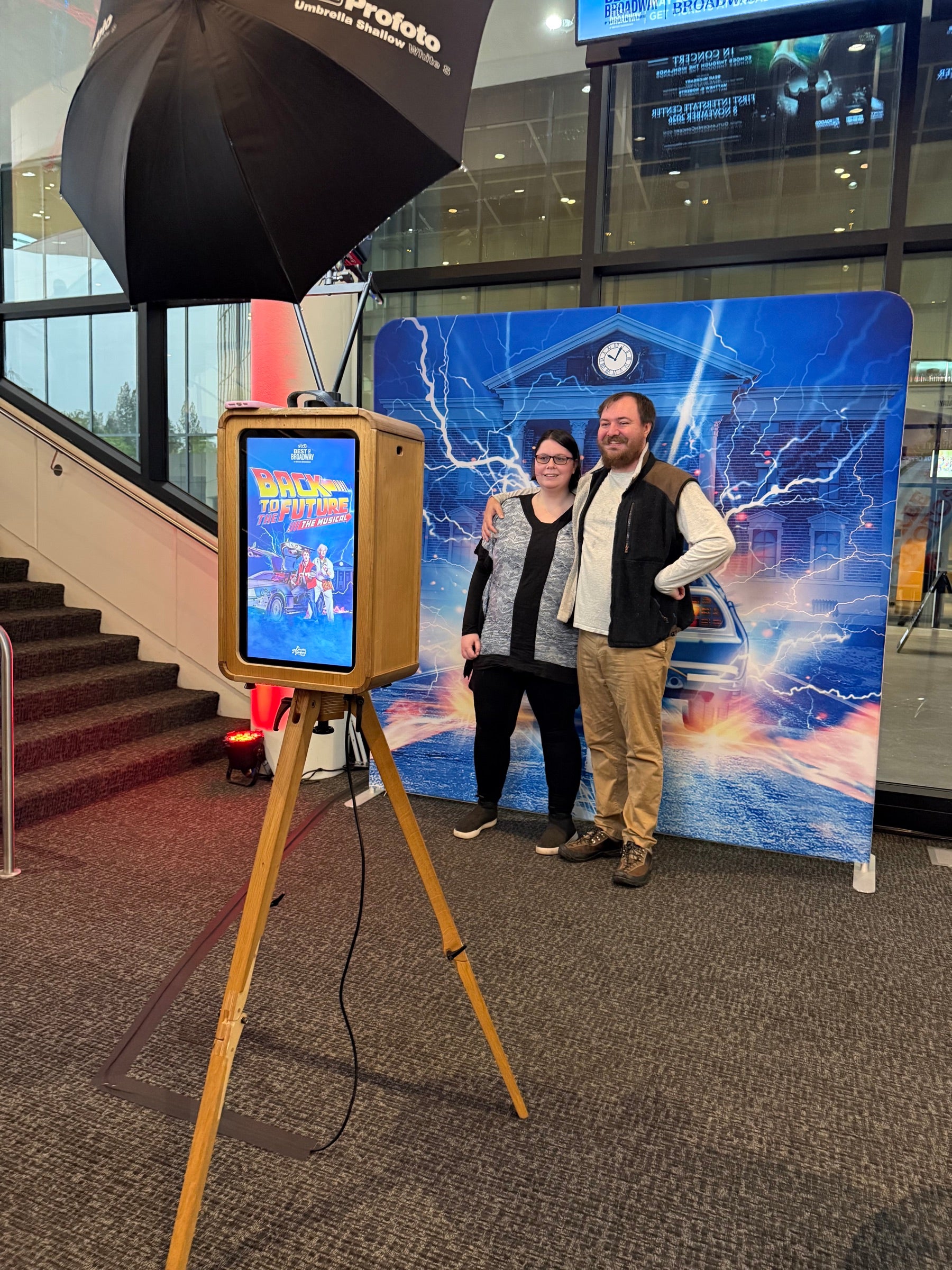 Electric Photoland Photo Booth and custom Back to the Future backdrop at STCU Best of Broadway in Spokane